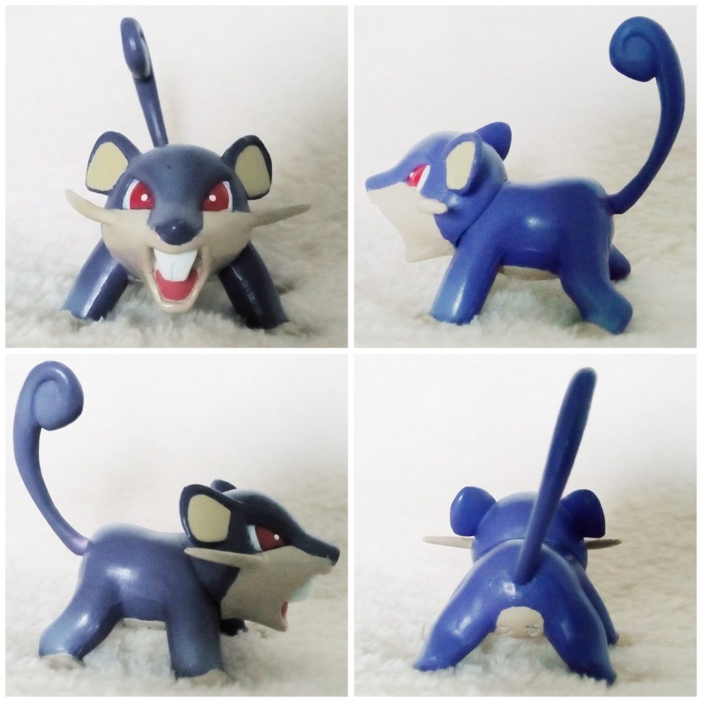 A front, left, right and back view of the Pokémon Tomy figure Rattata