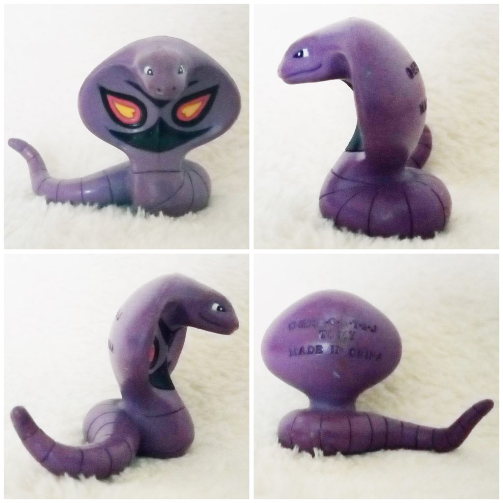 A front, left, right and back view of the Pokémon Tomy figure Arbok