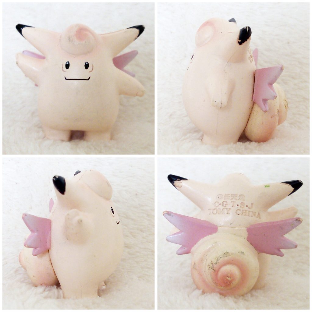 A front, left, right and back view of the Pokémon Tomy figure Clefable