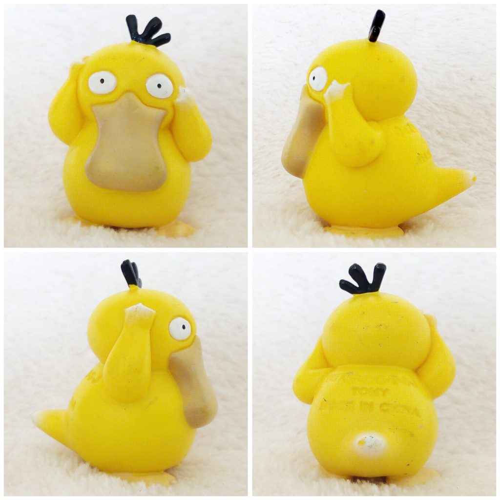 A front, left, right and back view of the Pokémon Tomy figure Psyduck