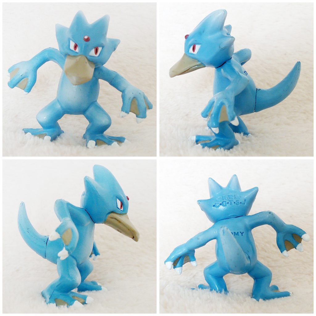 A front, left, right and back view of the Pokémon Tomy figure Golduck