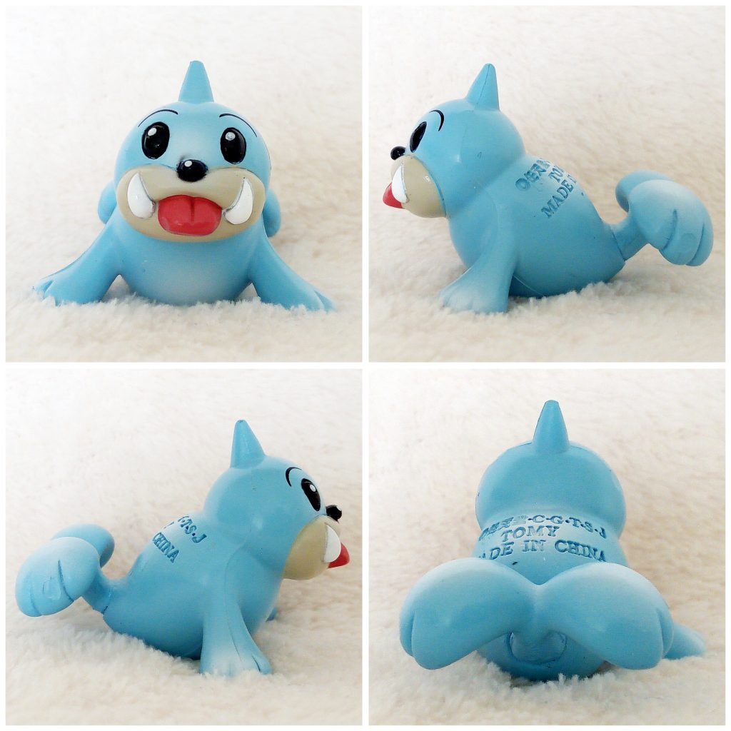 A front, left, right and back view of the Pokémon Tomy figure Seel
