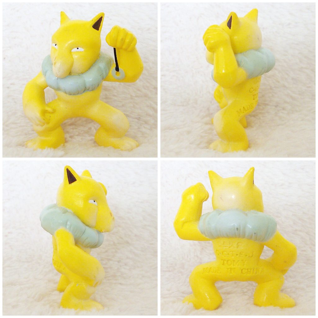 A front, left, right and back view of the Pokémon Tomy figure Hypno