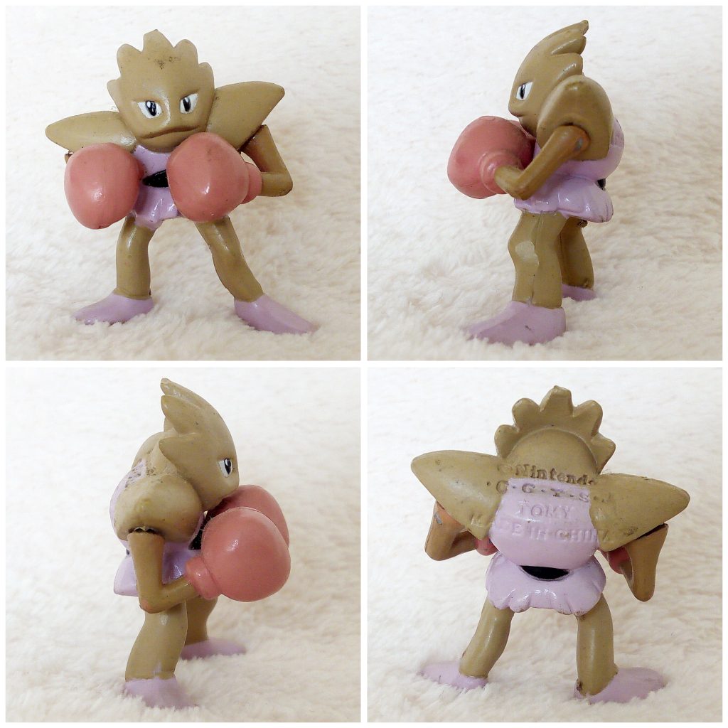 A front, left, right and back view of the Pokémon Tomy figure Hitmonchan
