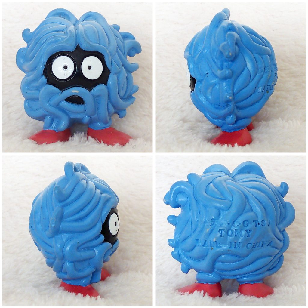 A front, left, right and back view of the Pokémon Tomy figure Tangela