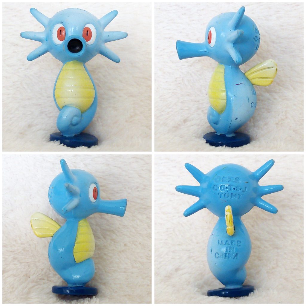 A front, left, right and back view of the Pokémon Tomy figure Horsea