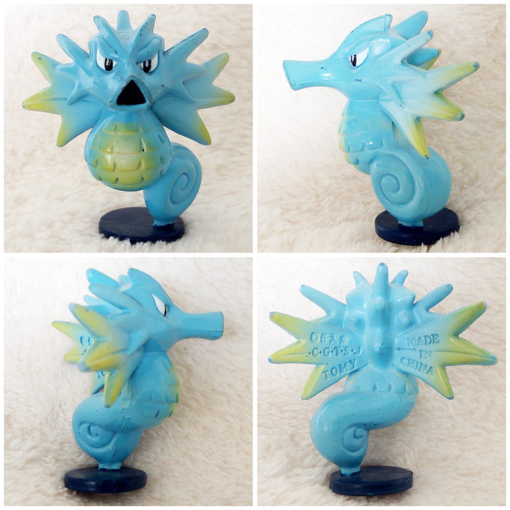 A front, left, right and back view of the Pokémon Tomy figure Seadra