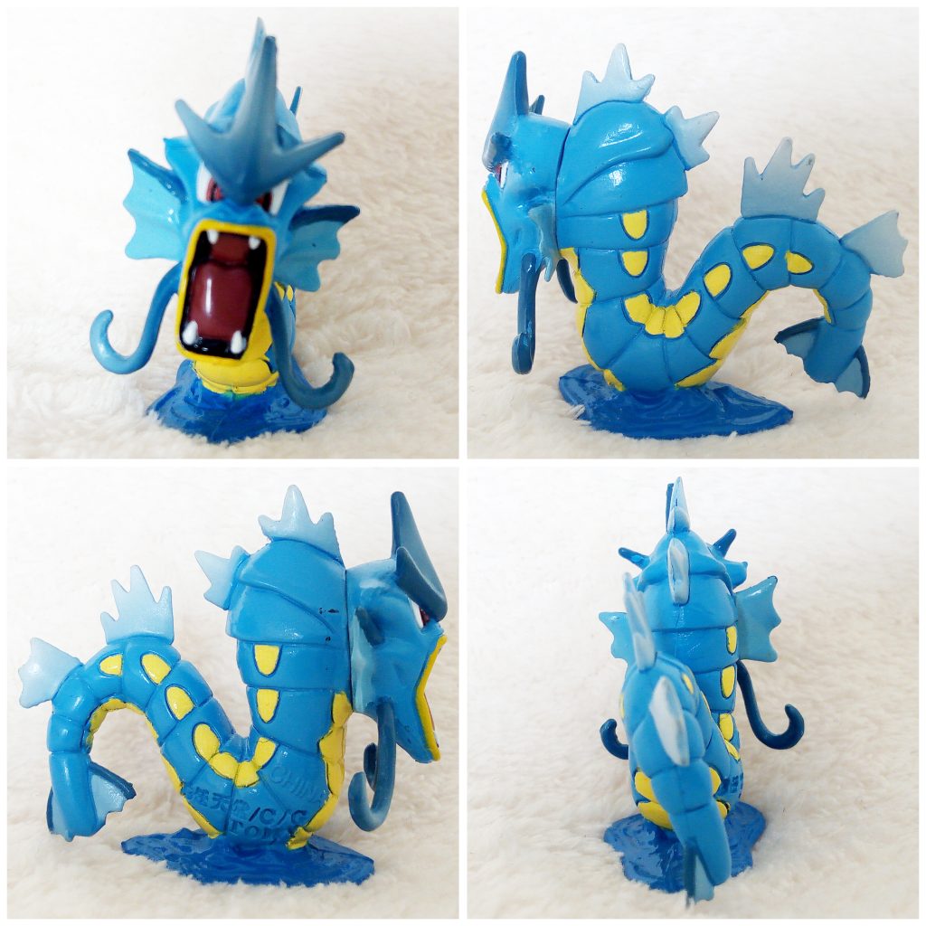 A front, left, right and back view of the Pokémon Tomy figure Gyarados