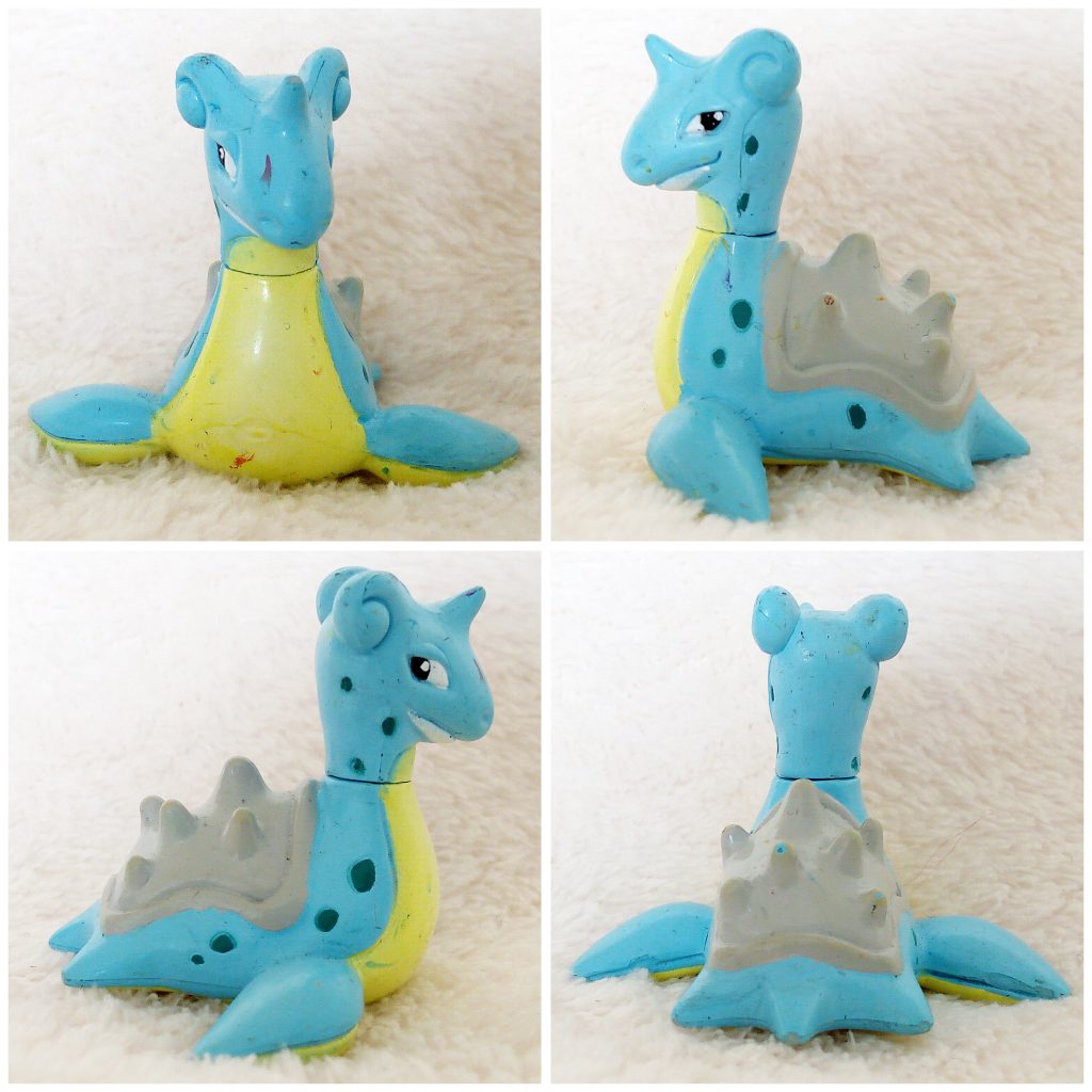 A front, left, right and back view of the Pokémon Tomy figure Lapras