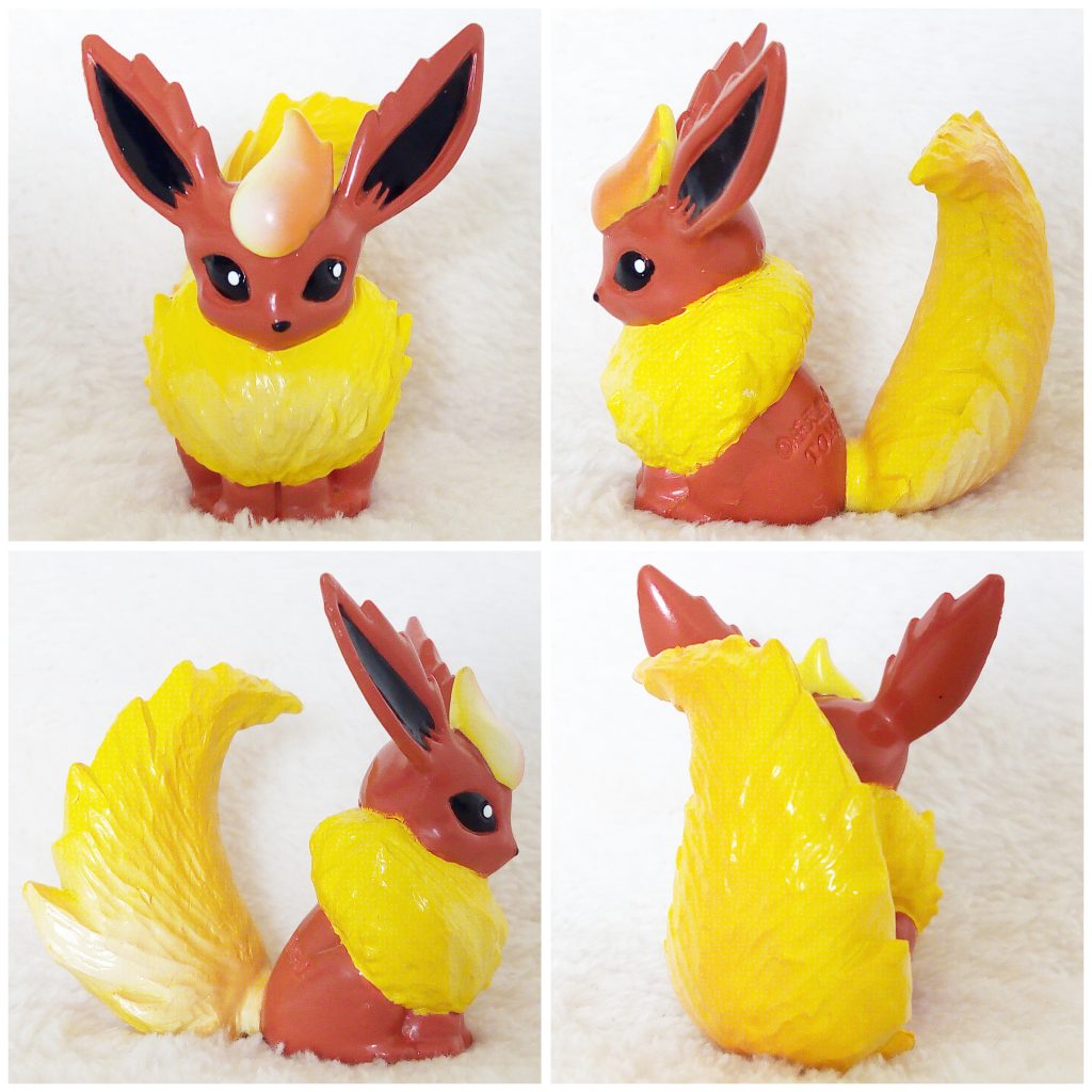 A front, left, right and back view of the Pokémon Tomy figure Flareon