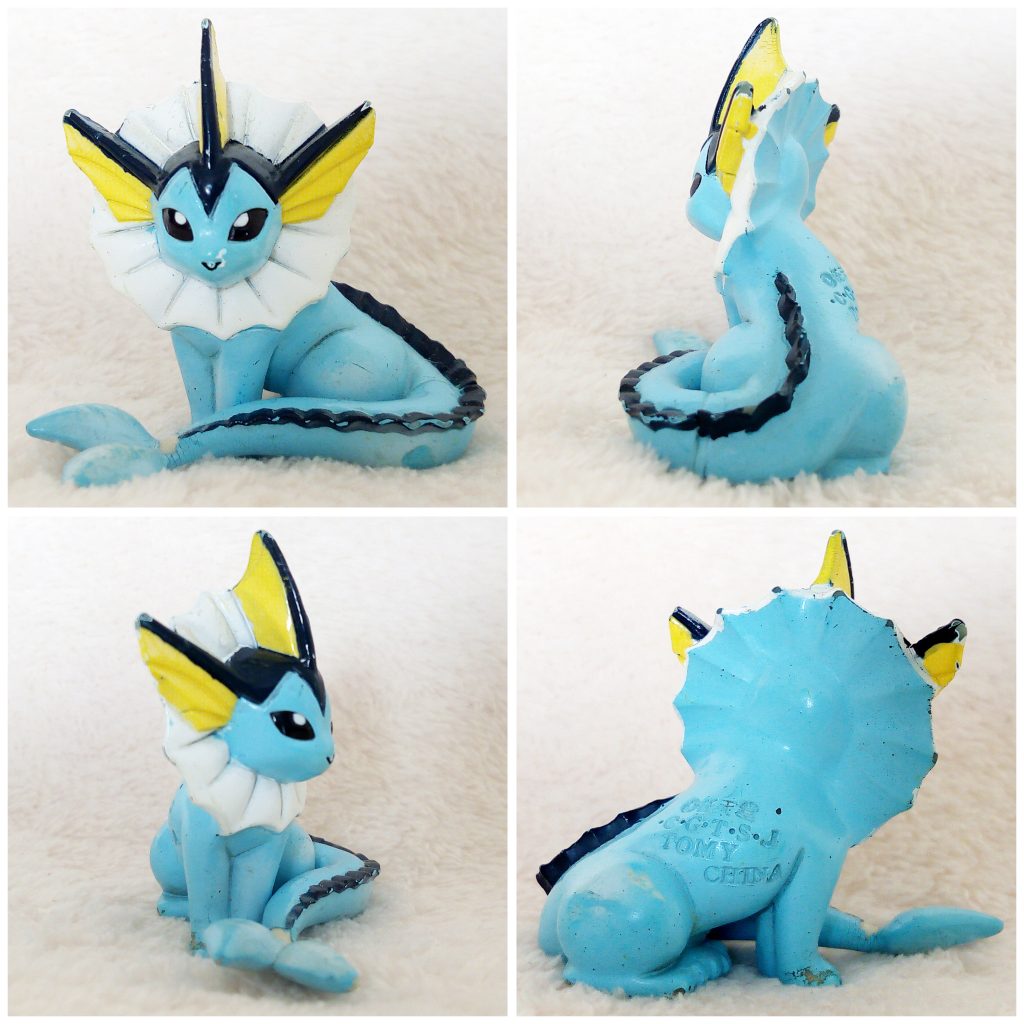 A front, left, right and back view of the Pokémon Tomy figure Vaporeon