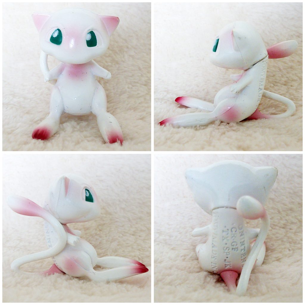 A front, left, right and back view of the Pokémon Tomy figure Mew