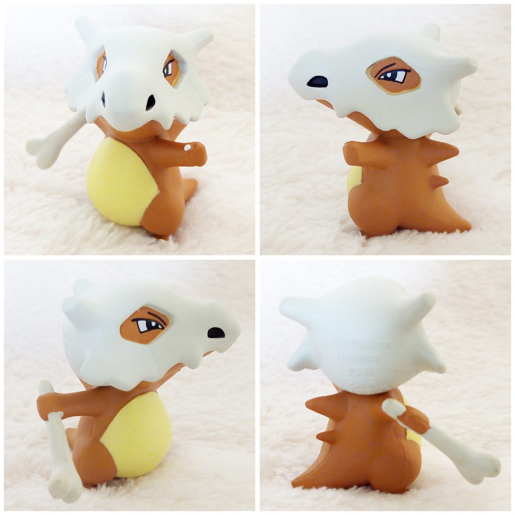 A front, left, right and back view of the Pokémon Tomy figure Cubone Battle pose