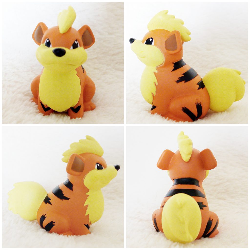 A front, left, right and back view of the Pokémon Tomy figure Growlithe
