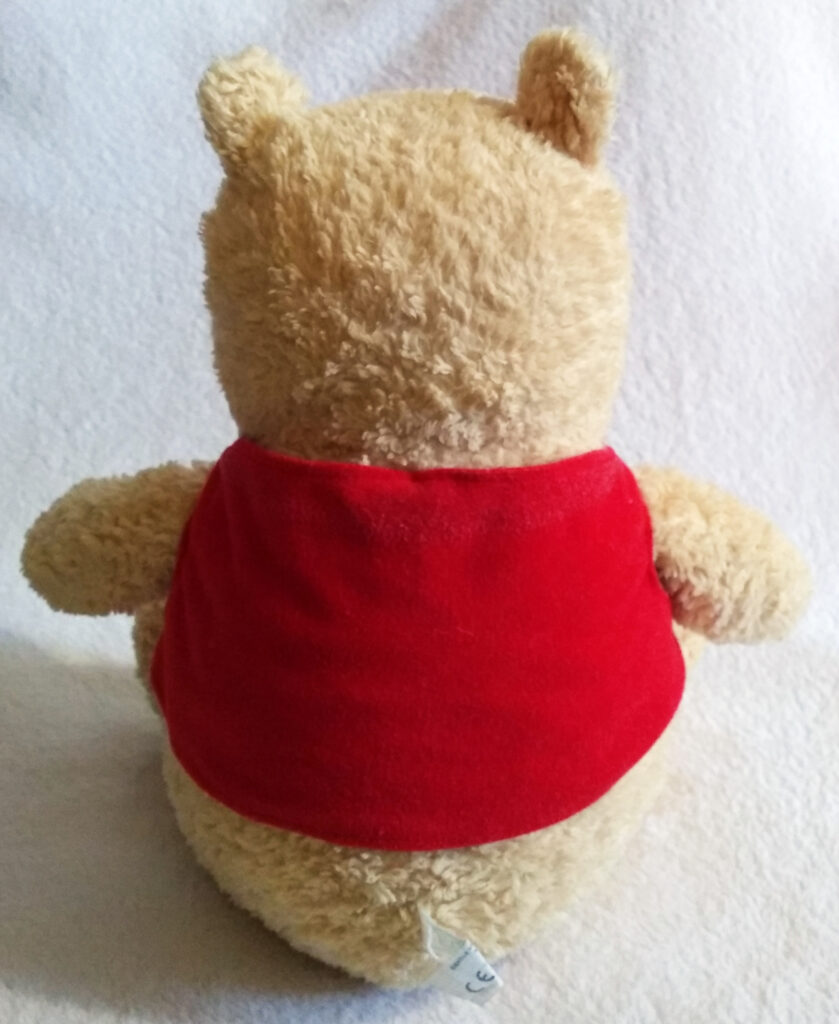 A back view of Winnie the Pooh, Classic Pooh plush by Golden Bear