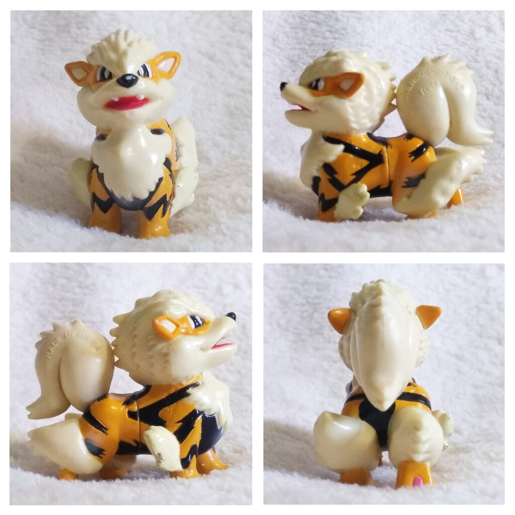 A front, left, right and back view of the Pokémon Tomy figure Arcanine