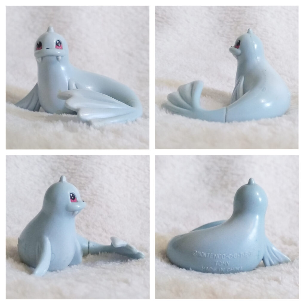 A front, left, right and back view of the Pokémon Tomy figure Dewgong