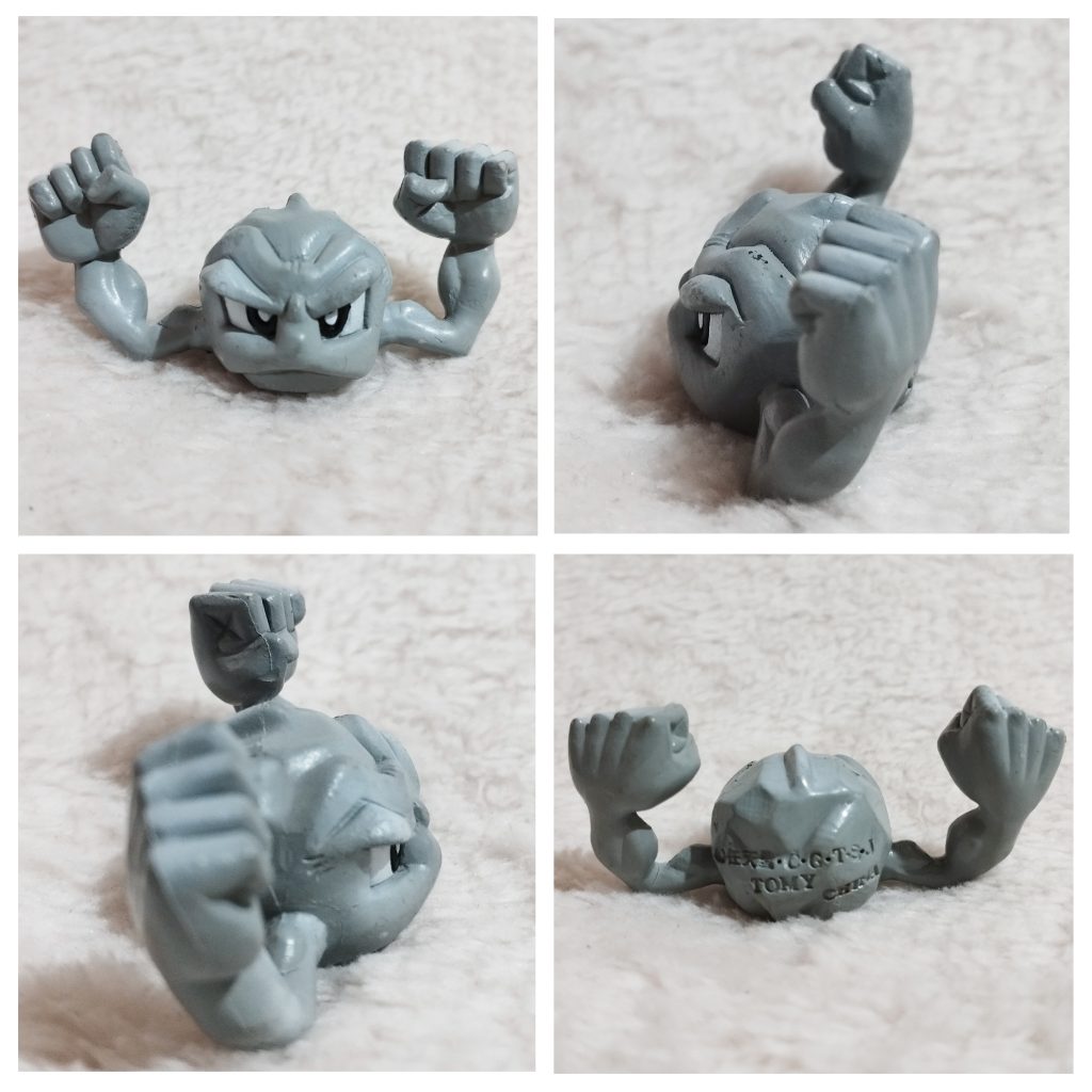 A front, left, right and back view of the Pokémon Tomy figure Geodude