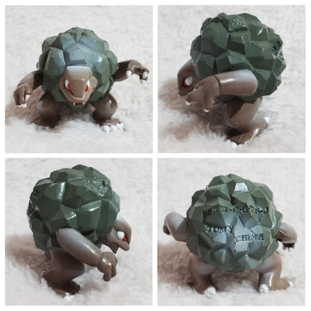 A front, left, right and back view of the Pokémon Tomy figure Golem