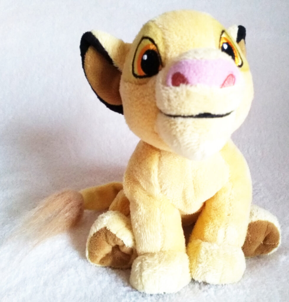 Simba (young) 2010 UK Disney Store plush by Disney Store - sitting